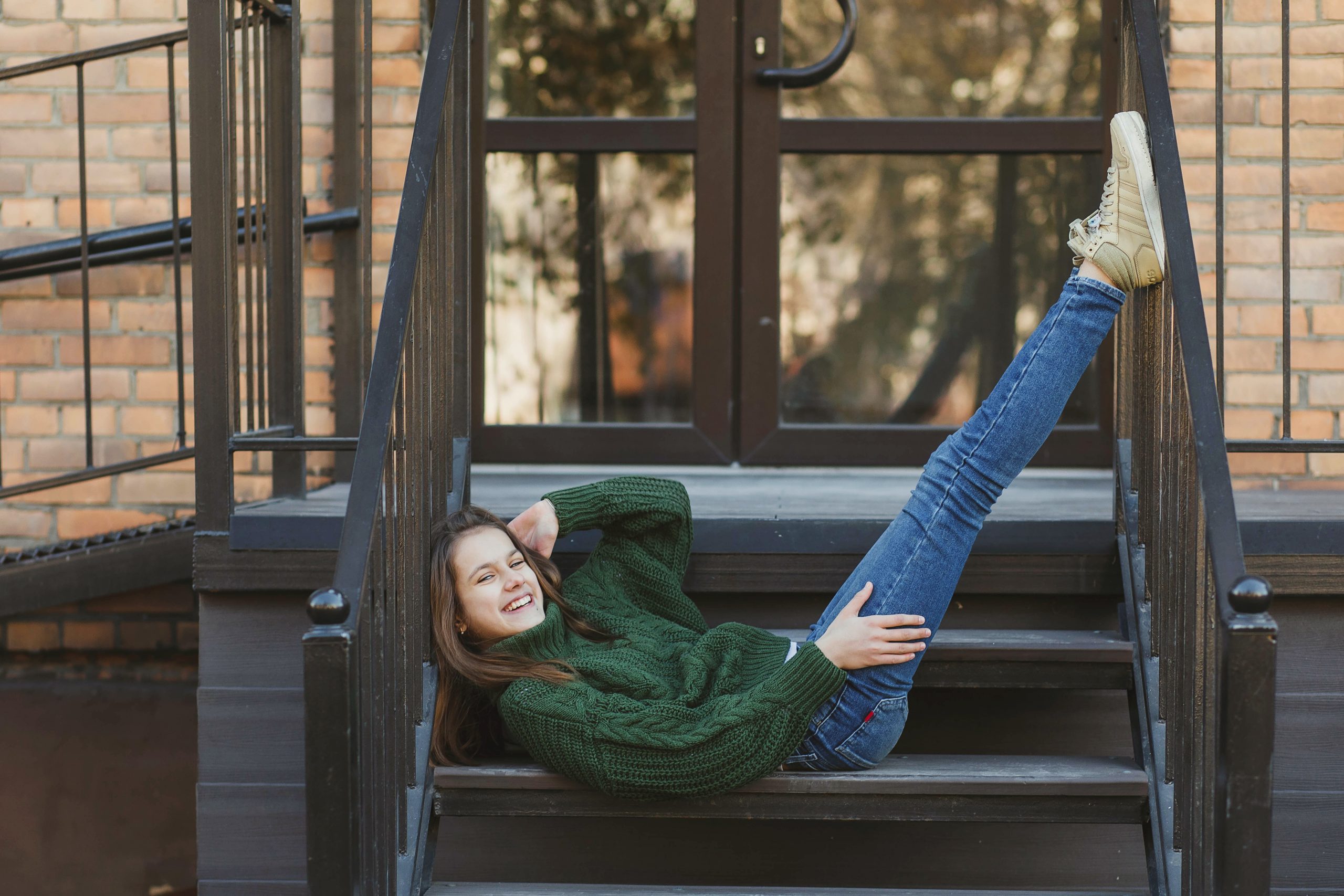 the girl is lying on the stairs with her legs up 2023 11 27 04 51 27 utc scaled